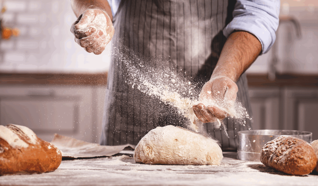 a guy baking some bread