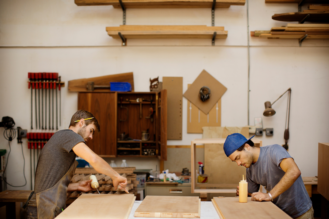 two men working in their wood shop